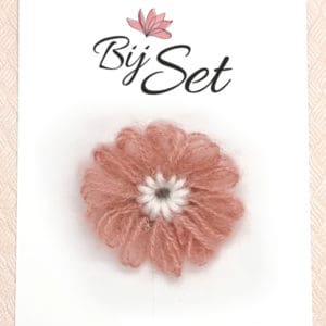 roze antislip knipje met wol accessoire voor de winter