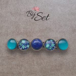 Haarknip met in petrol bloem kleuren