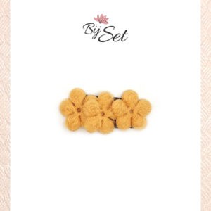 gele bloemen op een antislip haarknipje voor baby's of dun haar