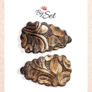 knipjes met bloemenprint in bruin brons tint