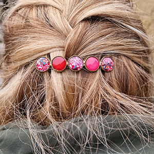 dames haarknip in roze tinten met bloemen