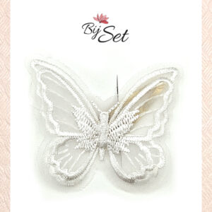 witte vlinder op haarknipje